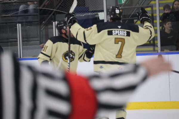 The ref signals a goal for the East Hants Penguins as Regan Spears and a teammate celebrate. (Healey photo)